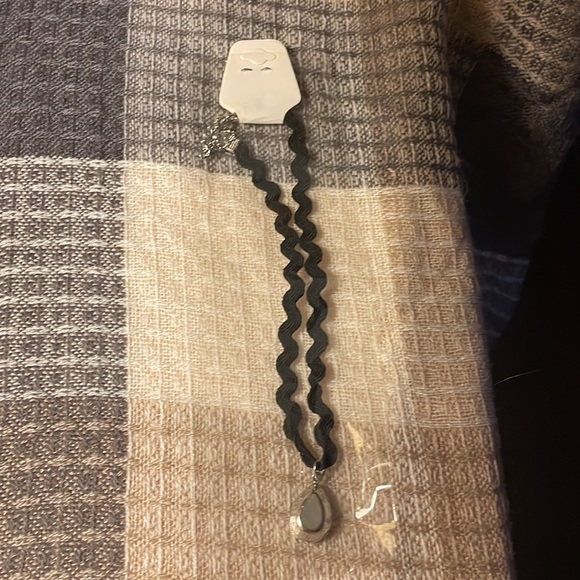 Black colored corded ribbon shaped with jewel pendant. New in package - Picture 4 of 5